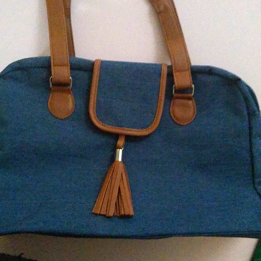 All seasons blue handbag with decorative tassel